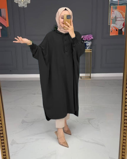 بلوزة نسائية بأكمام الوطواط