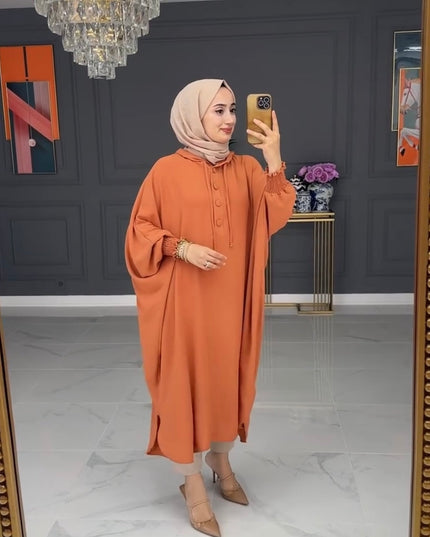 بلوزة نسائية بأكمام الوطواط