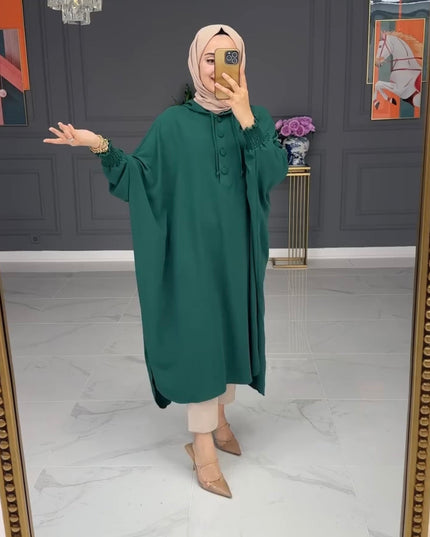 بلوزة نسائية بأكمام الوطواط